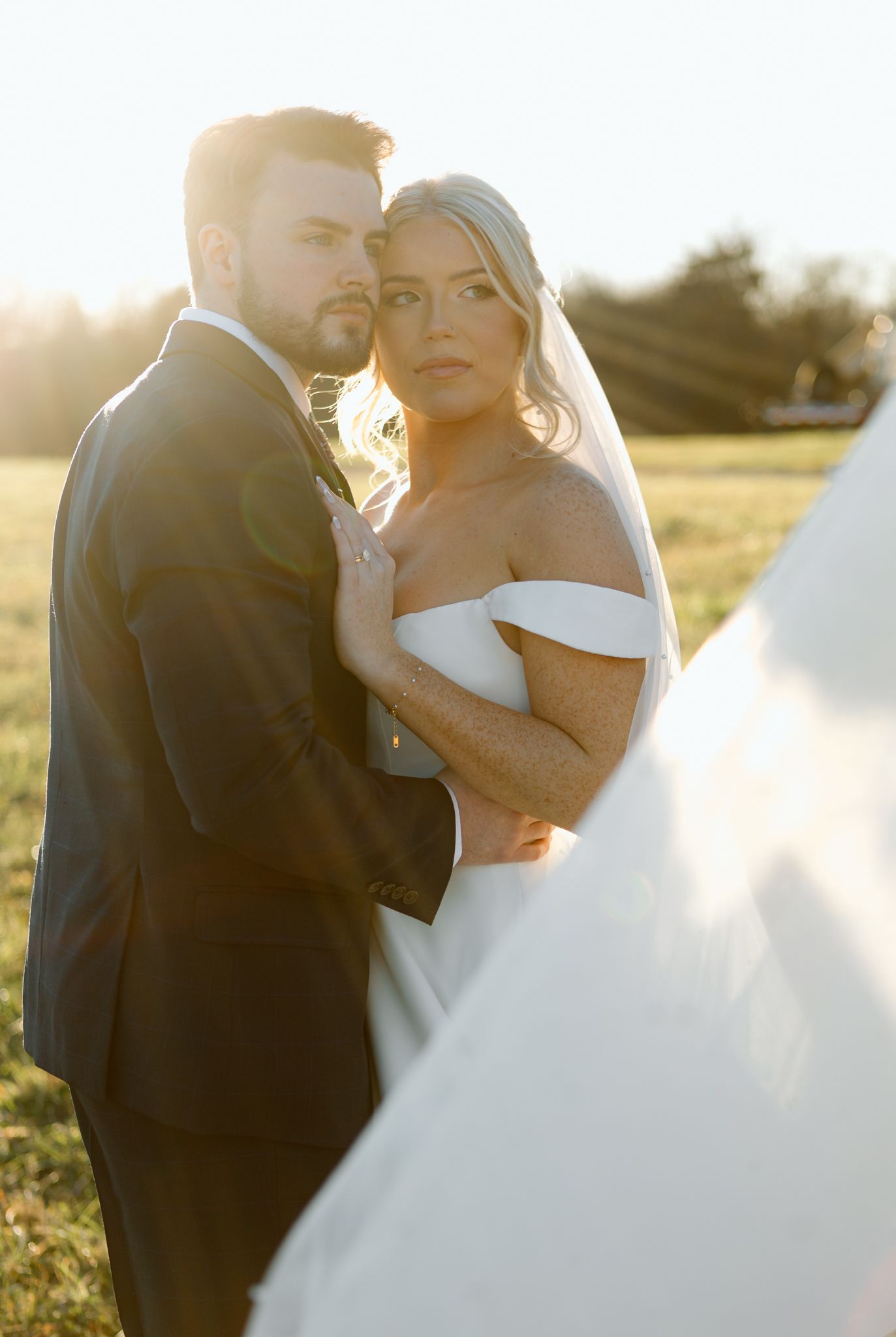 Bride and groom in golden hour light at Silo Farms, Kentucky, capturing a romantic wedding moment