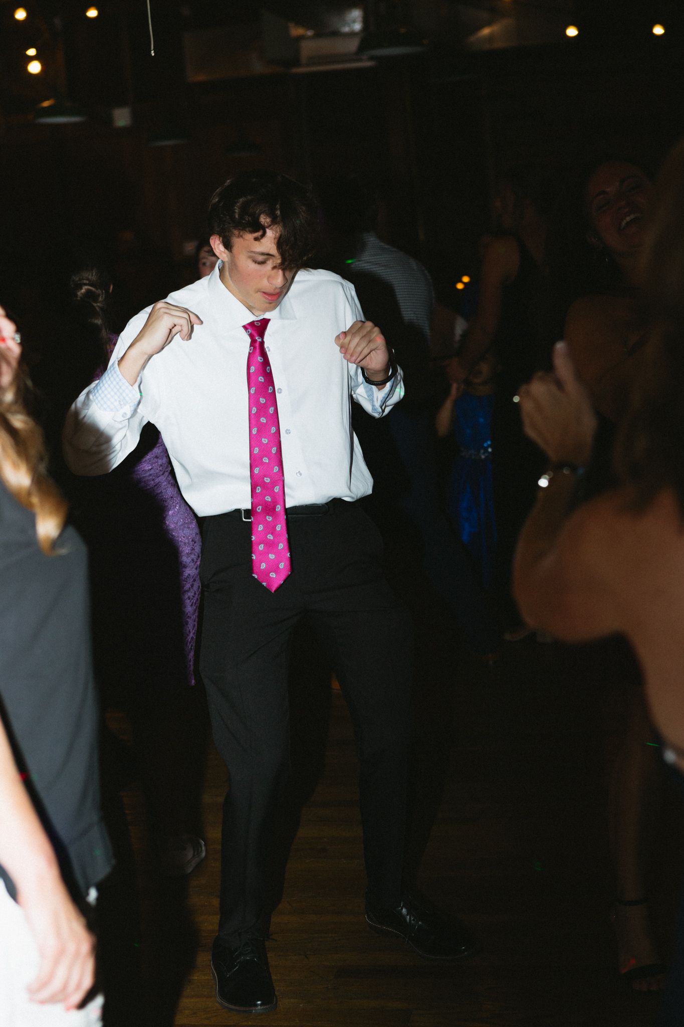 Guests dancing joyfully at a lively wedding reception in Kentucky