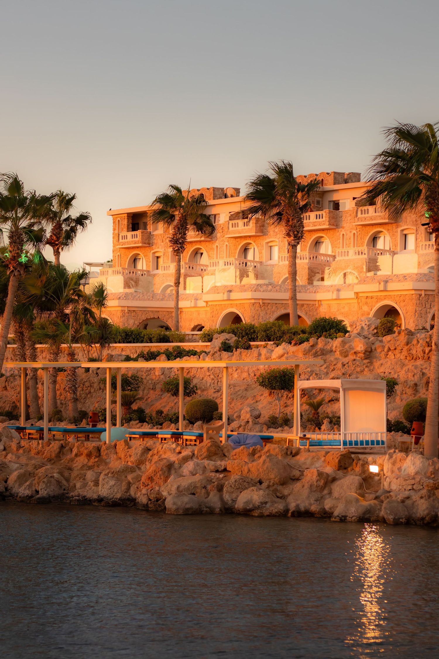 Sunset light over a luxury beachfront resort