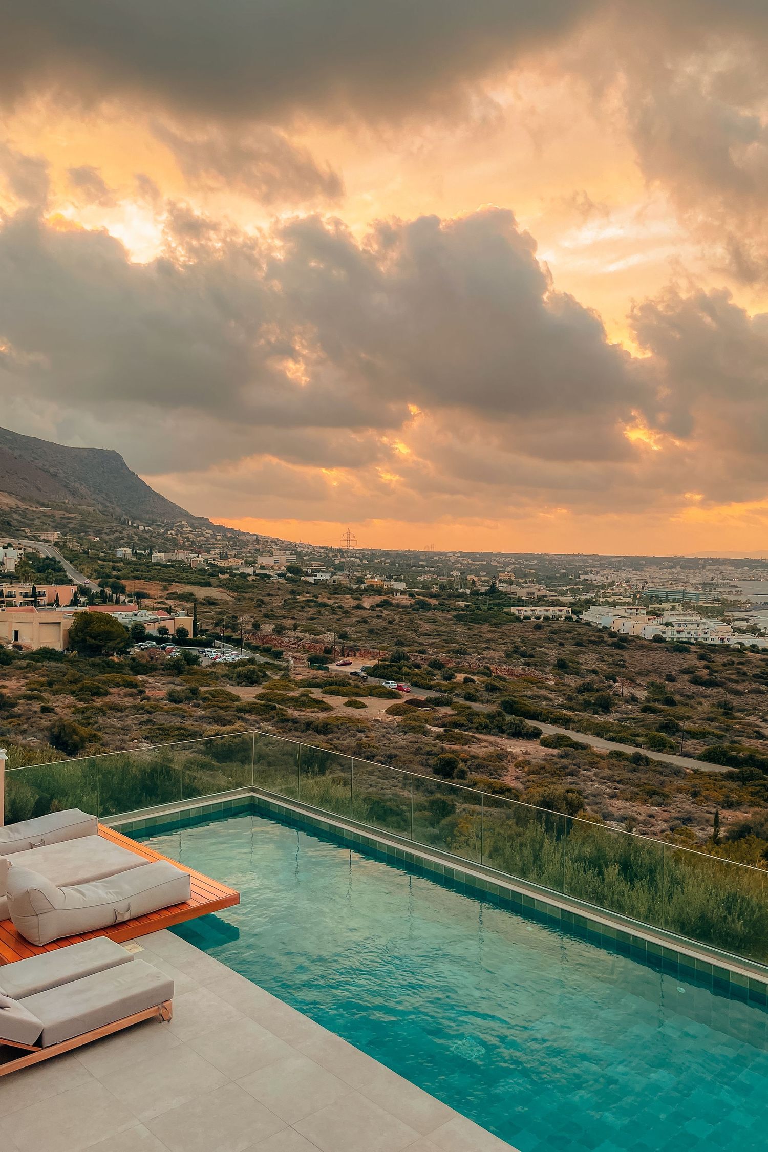 Luxury hotel pool overlooking the Mediterranean Sea in Greece