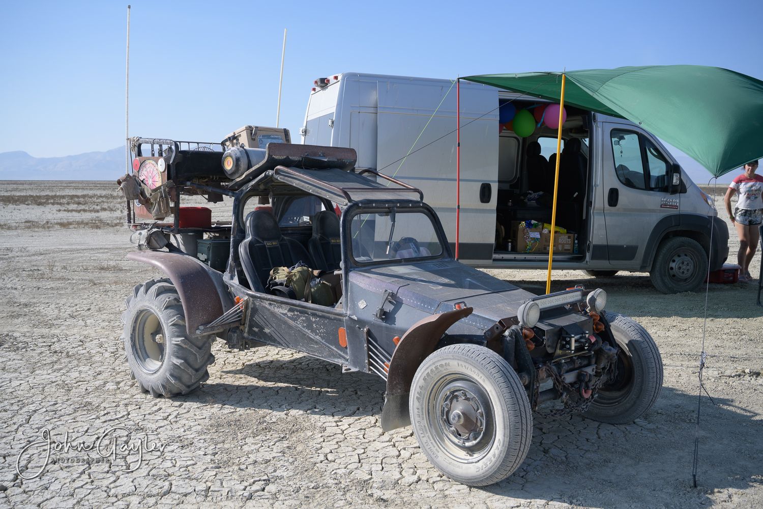 An off-road custom roadster with huge wheels on the playa at Black Rock Desert in Nevada