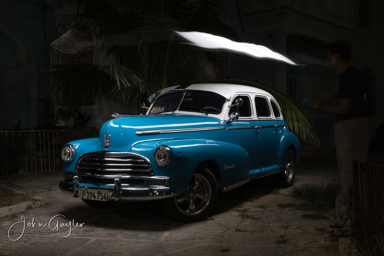 A single frame from a John Gayler light painting of a classic  1946 Chevrolet Fleetmaster highlighting the curves and paint in Old Havana