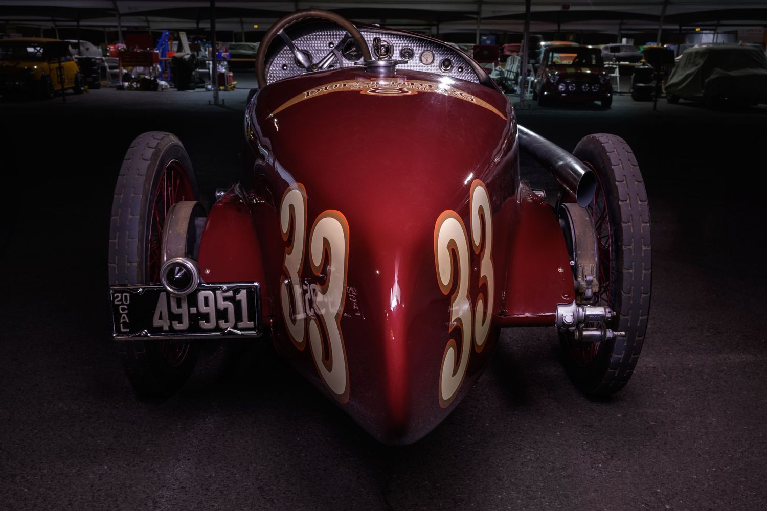 The Old Crow Speed Shop 1920 Duesenberg Straight 8 race car at the Sonoma Speedway light painted by John Gayler Photography rear view