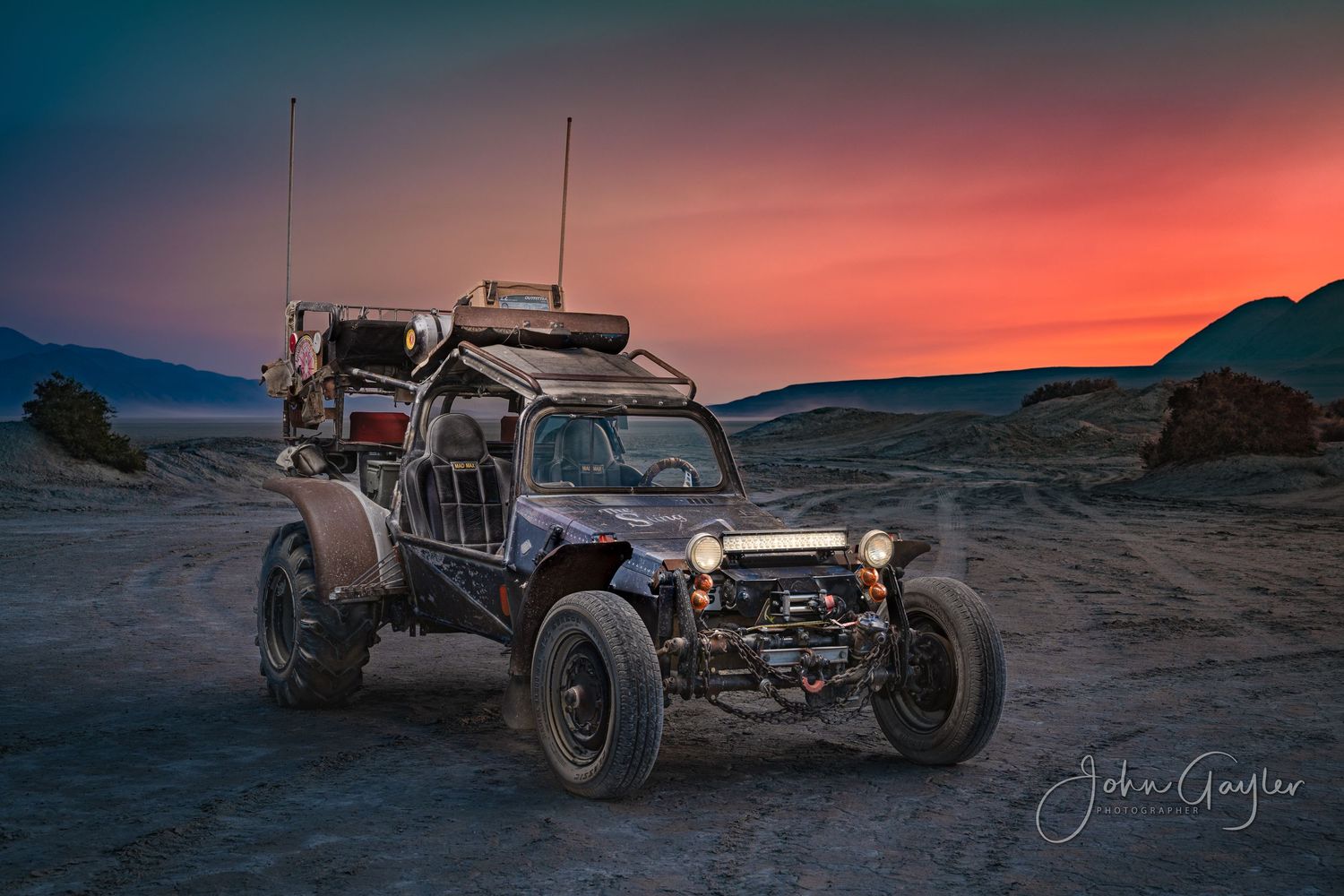 Mad Max on the Playa at Black Rock Desert 3/4 view with a colorful sunset. A light painting for a fine art wall portrait by John Gayler