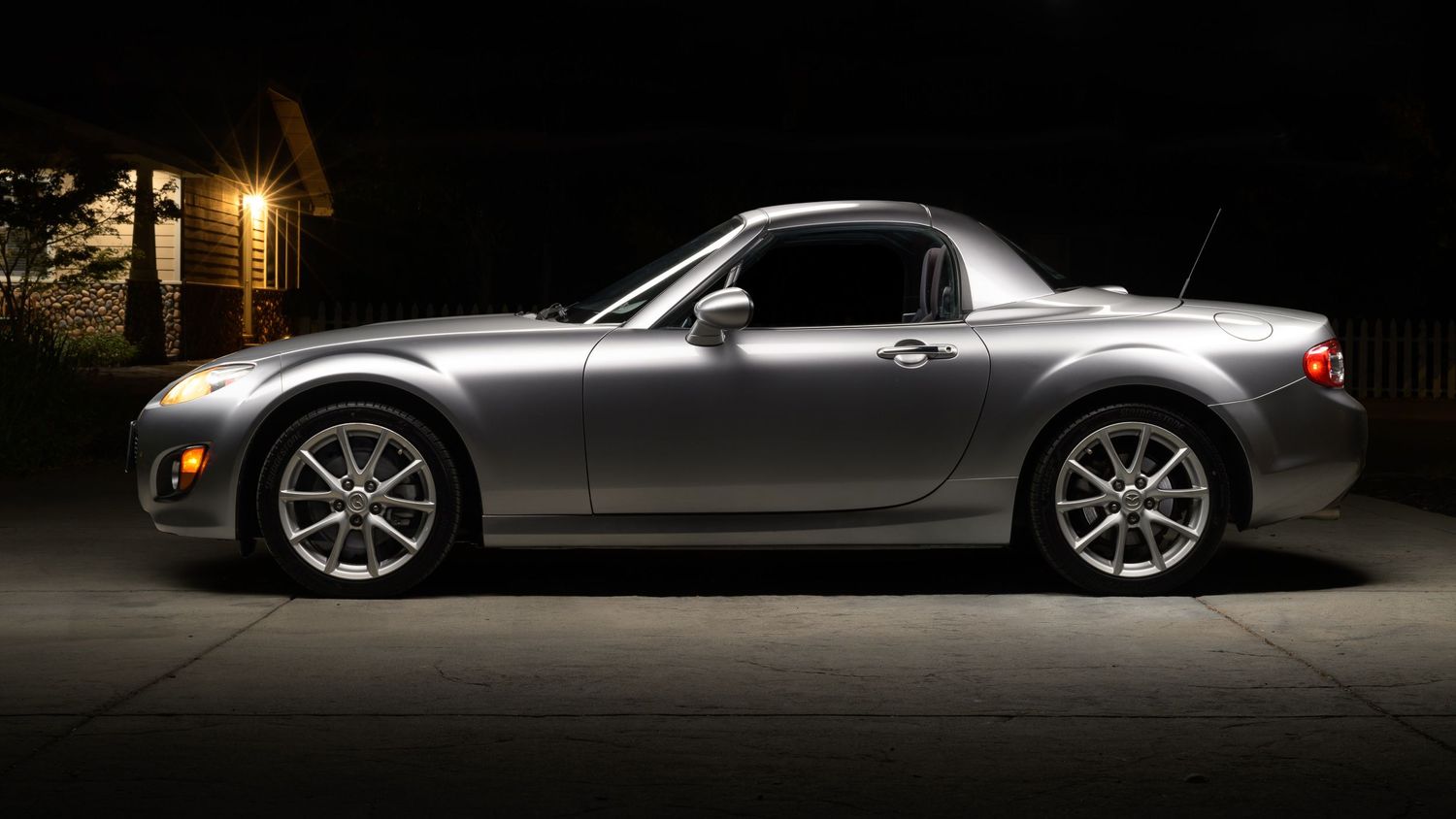 John Gayler Light Painting fine art wall portrait of a silver Mazda Miata MX-5 sports car photographed at night with dramatic side lighting.