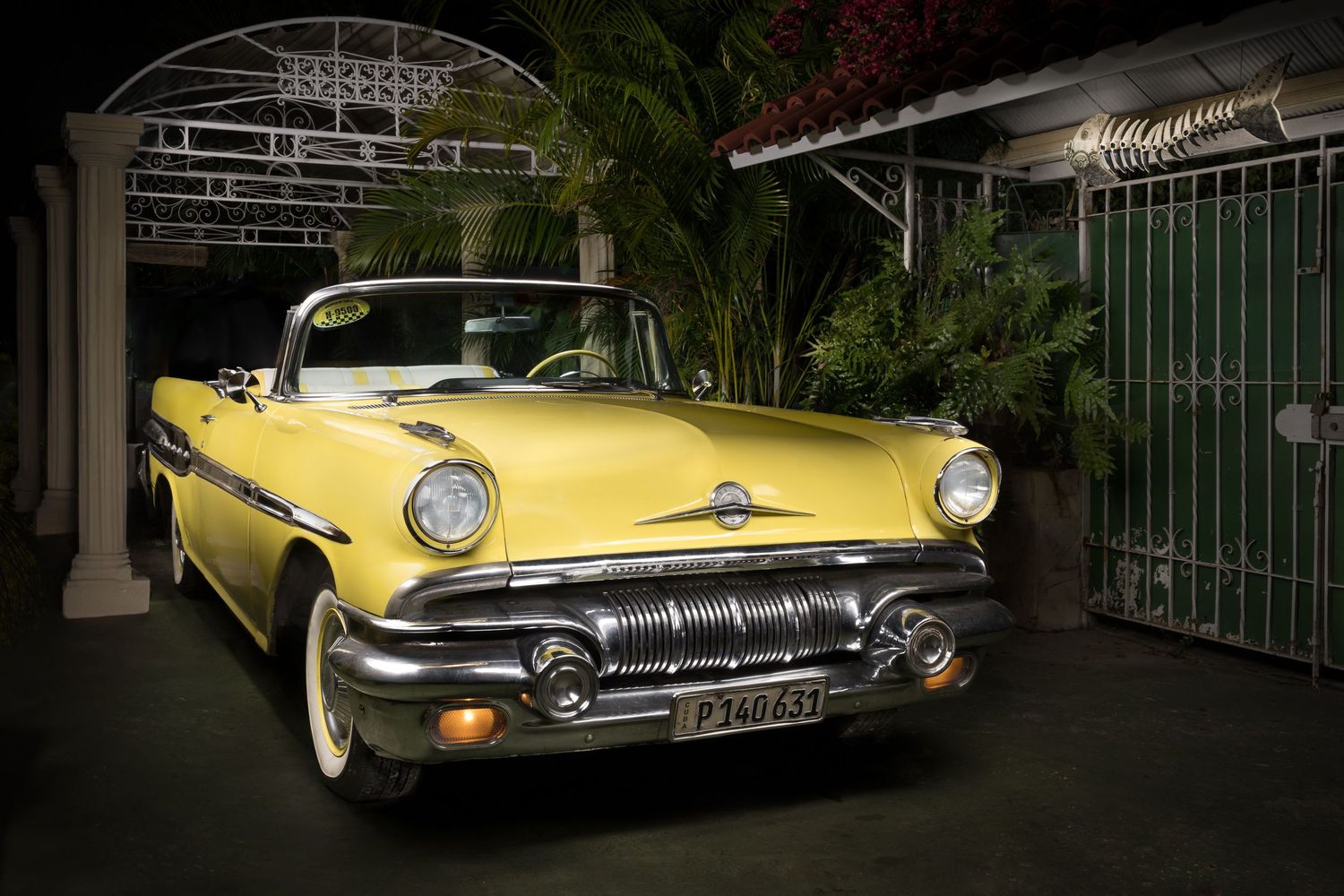 John Gayler Light Painting fine art wall portrait. Yellow 1957 Pontiac Star Chief convertible suburban parking in Havana Cuba
