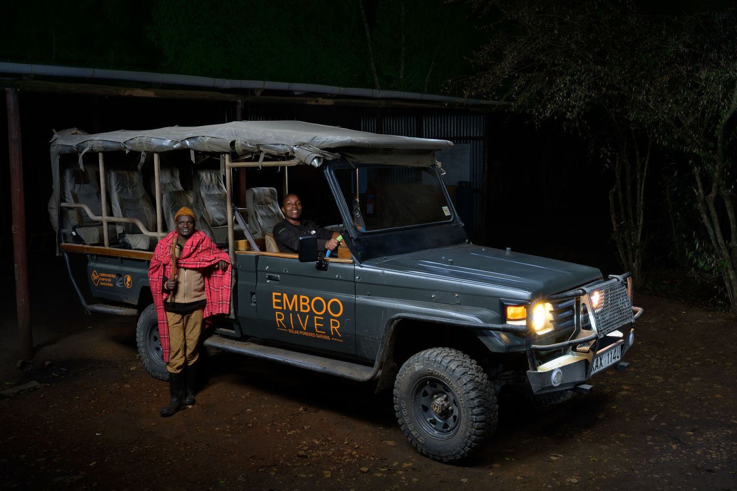 A John Gayler fine art wall portrait of an electric safari jeep with the Maasai at Emboo Camp in the  Maasai Mara National Reserve, Kenya.