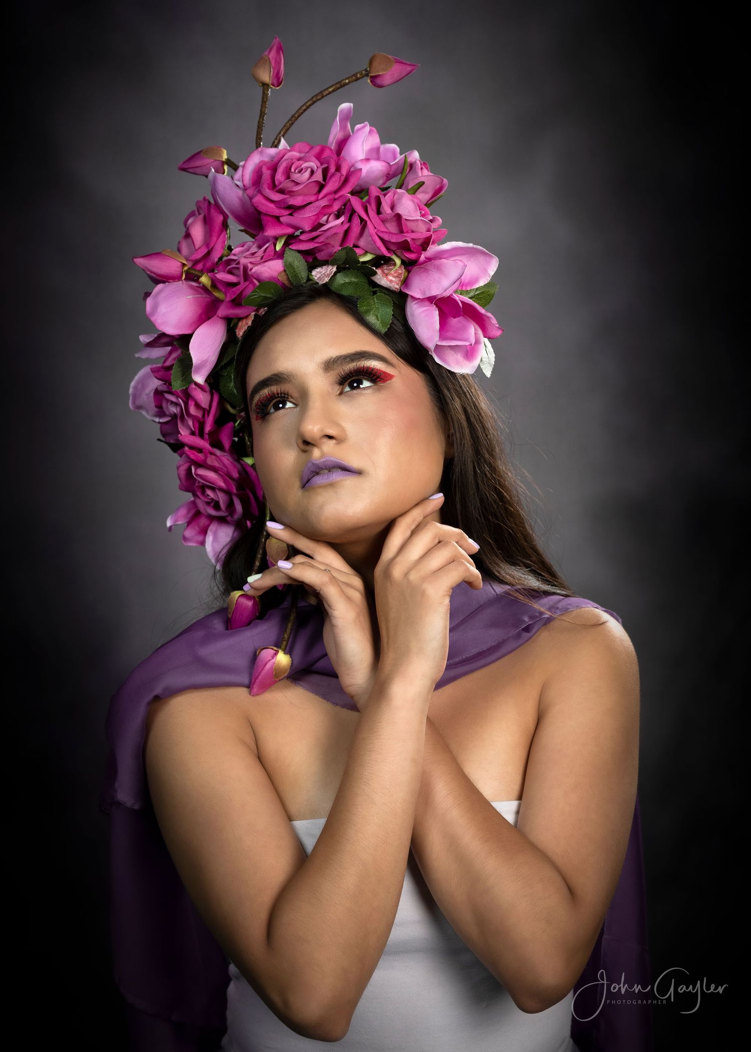 Artistic portrait series showing a young Hispanic woman in a contemplative pose wearing a pink floral crown against a dark background.