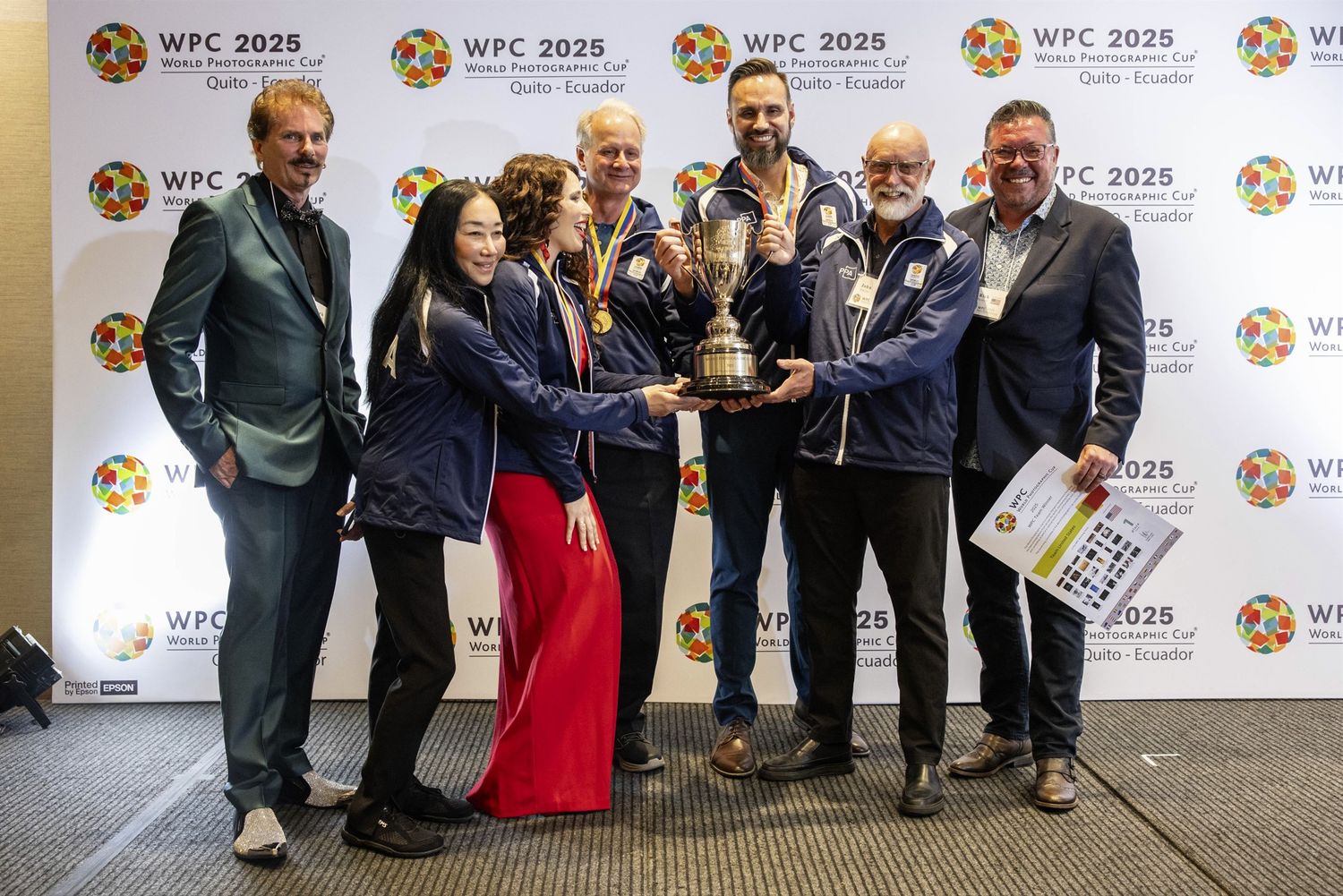 Members of Team USA celebrate winning the 2025 World Photographic Cup in Quito, Ecuador