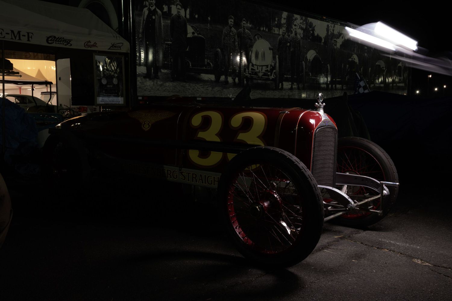 The Old Crow Speed Shop 1920 Duesenberg Straight 8 race car in the paddock at the Sonoma Speedway light painted by John Gayler Photography