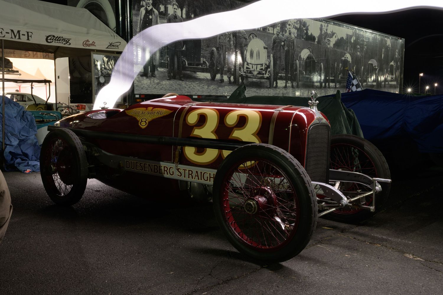The Old Crow Speed Shop 1920 Duesenberg Straight 8 race car in the paddock at the Sonoma Speedway light painted by John Gayler Photography