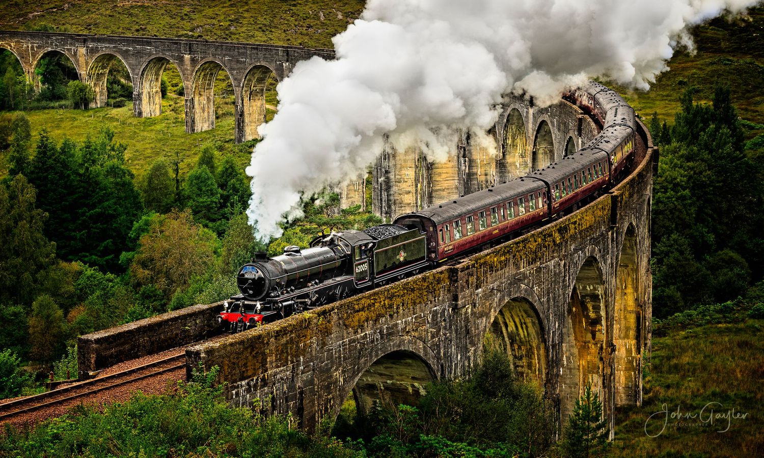 The Jacobite or Hogwarts Express team train runs between Fort William and Mallaig, voted one of the most scenic rail journeys in the world.