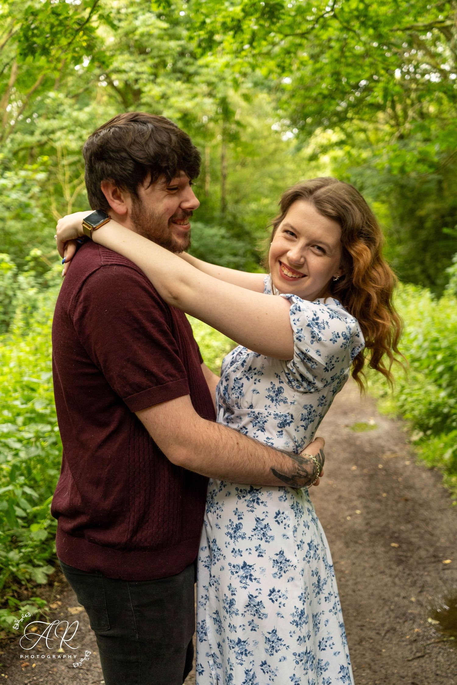 Candid romantic moments captured in sequence showing joyful interaction in a green forest setting.