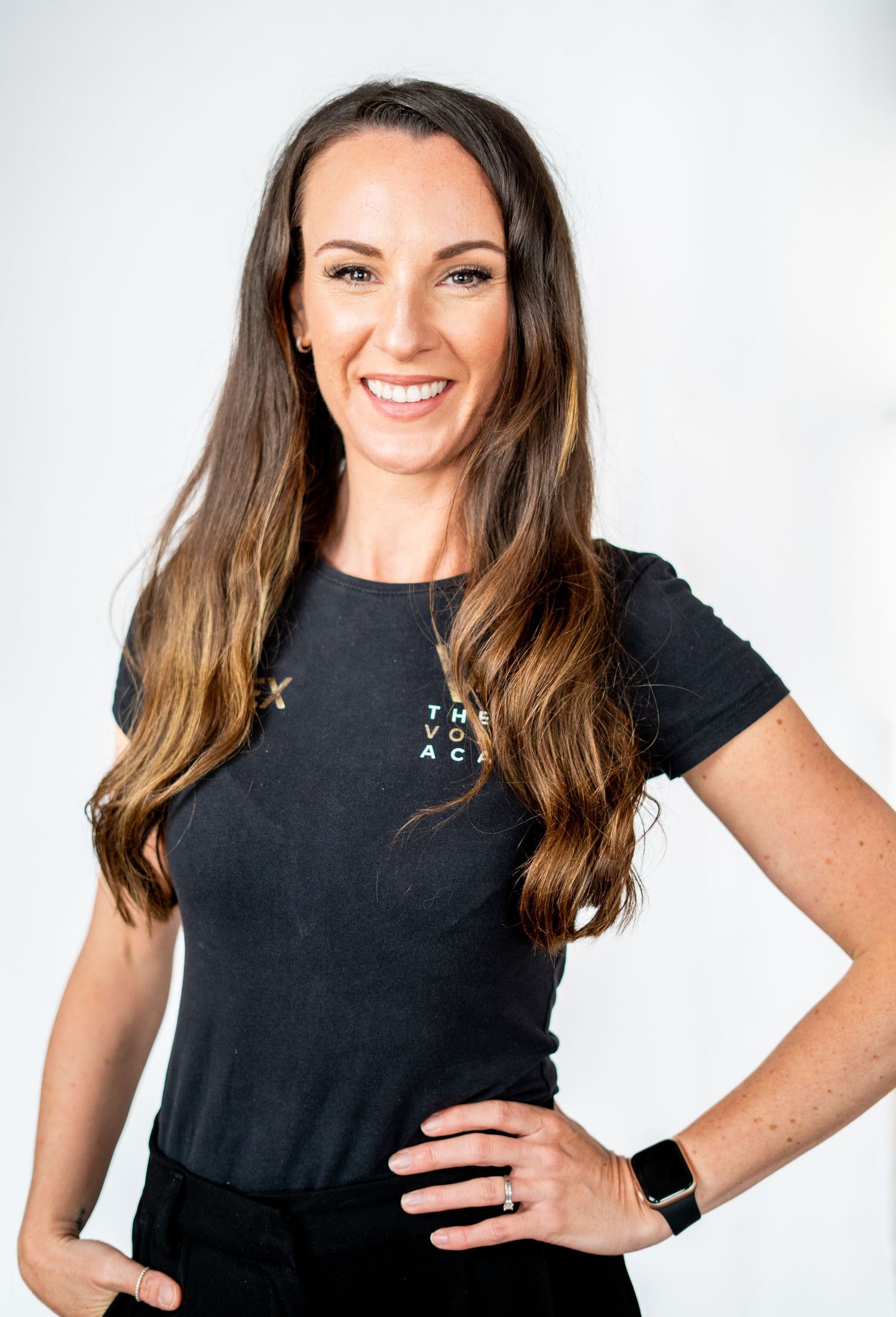 Dynamic business portrait series in black attire against white background.
