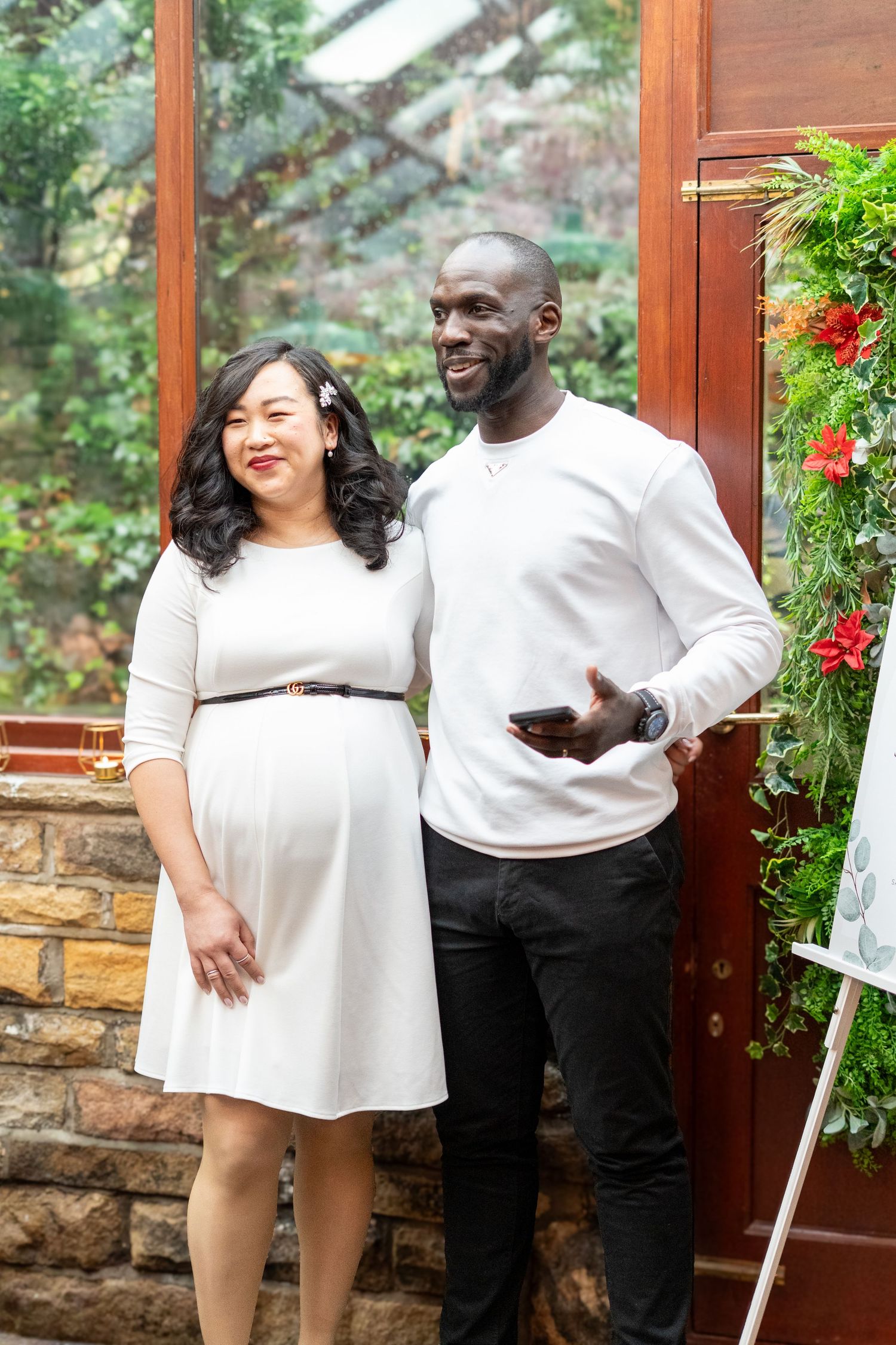 A sequence of candid moments showing emotional reactions and embraces in a decorated indoor space.
