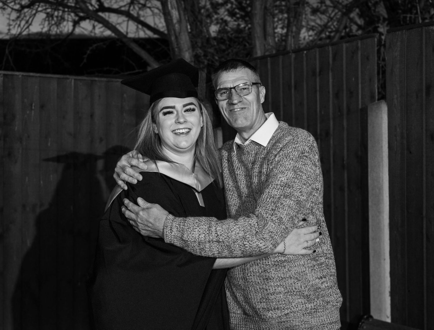 Candid graduation celebration photos with family members in outdoor setting.