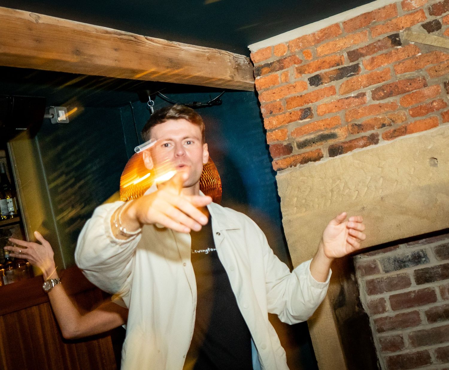 Party atmosphere captured in a sequence of candid moments at a bar.