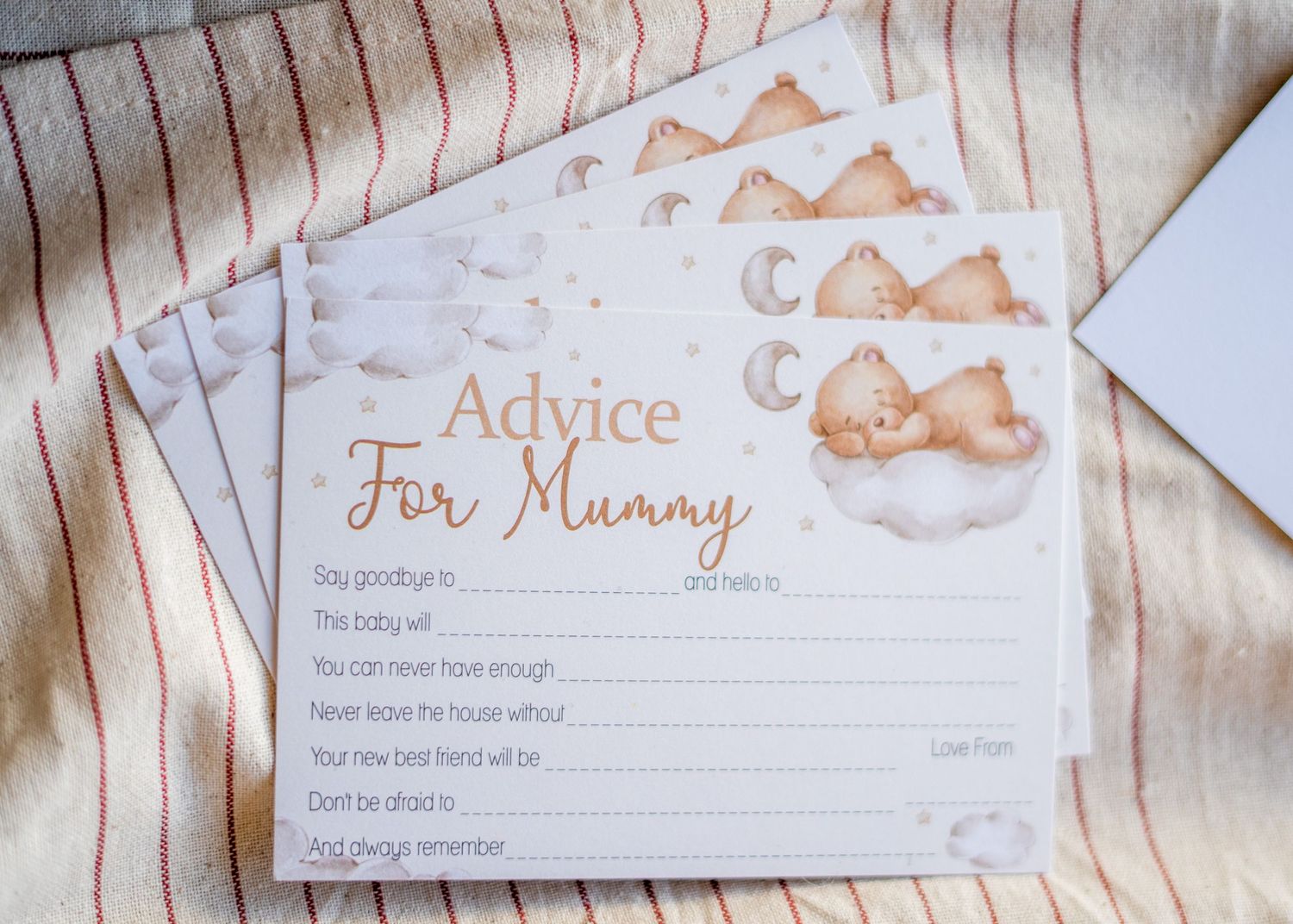 Baby shower advice cards with delicate illustrations of woodland animals and handwritten text.