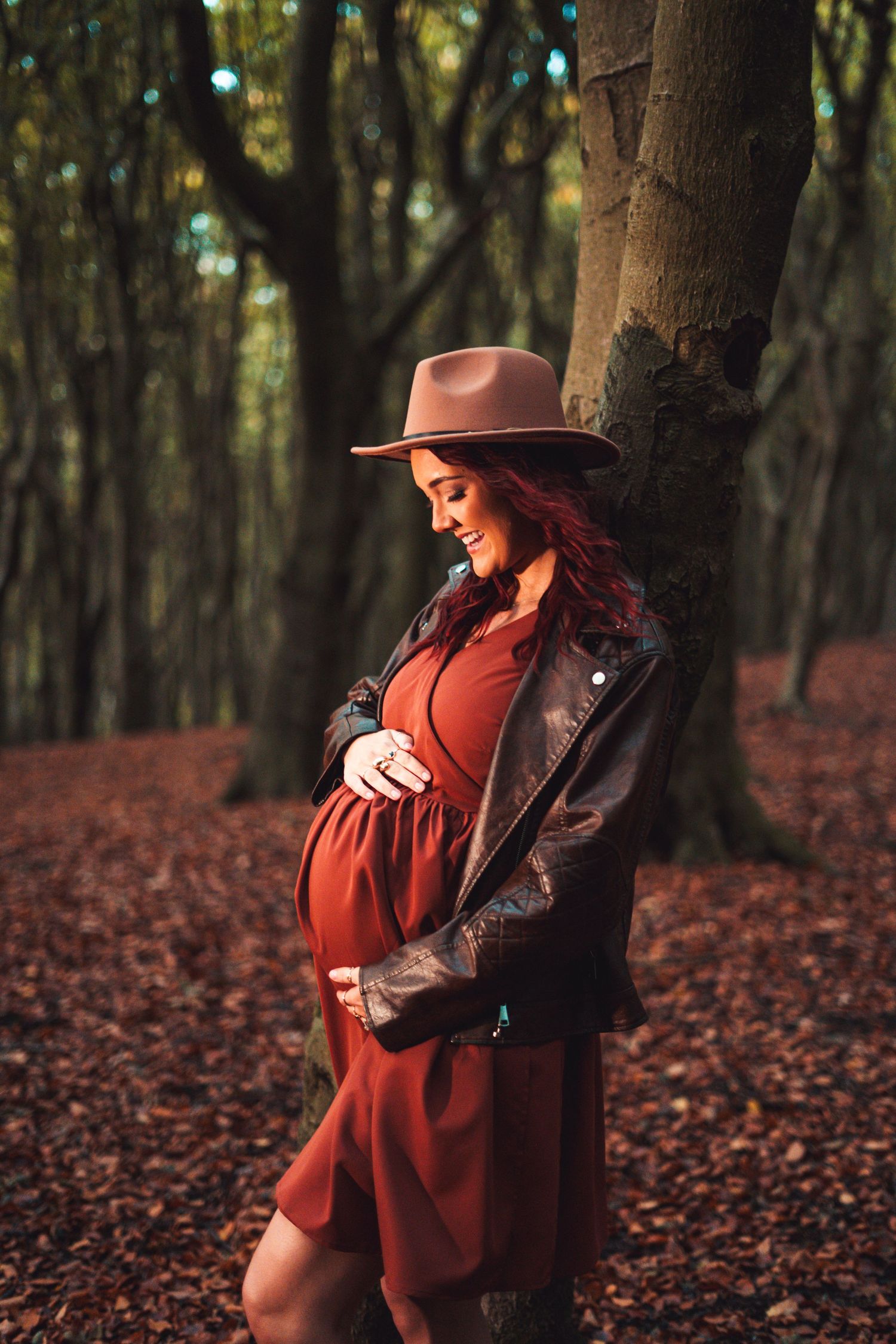 A series of photos showing someone in red clothing posing against autumn trees.