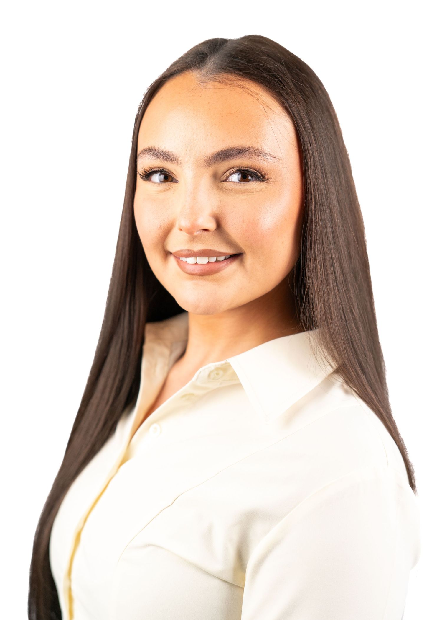 Professional portrait series in cream colored outfit against white background.