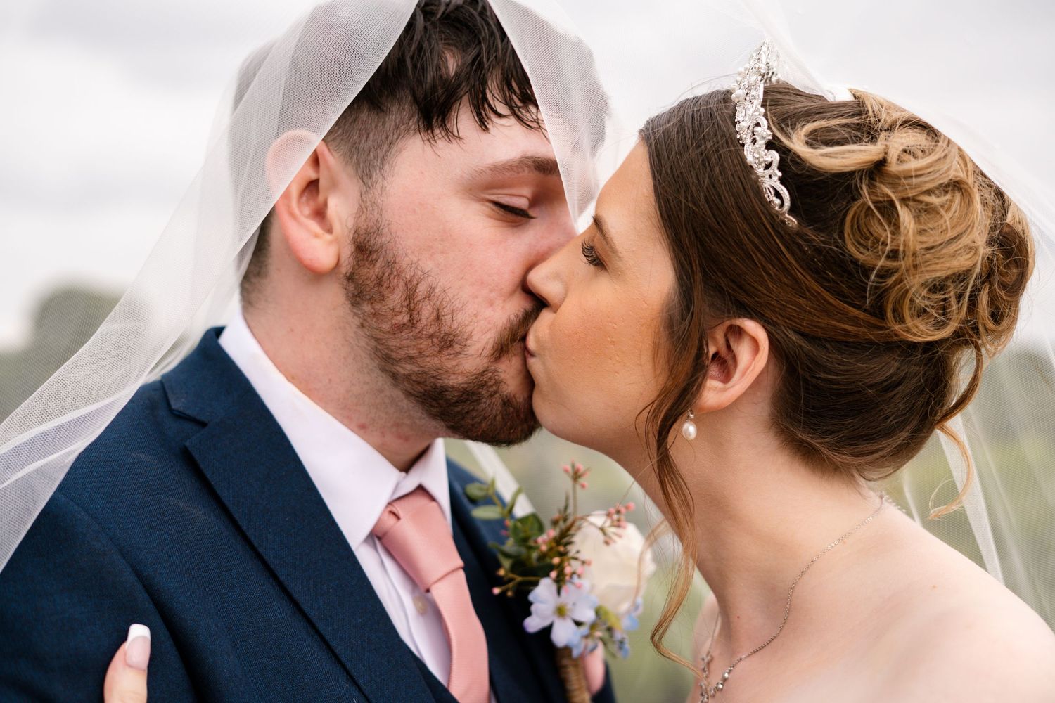 Close-up romantic wedding portraits showing tender moments between newlyweds.