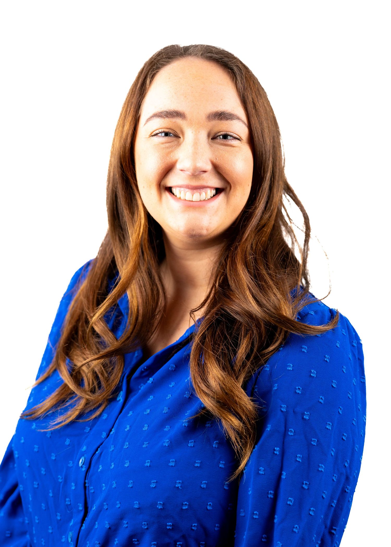 Portrait series showing joyful expressions in bright blue dotted top.