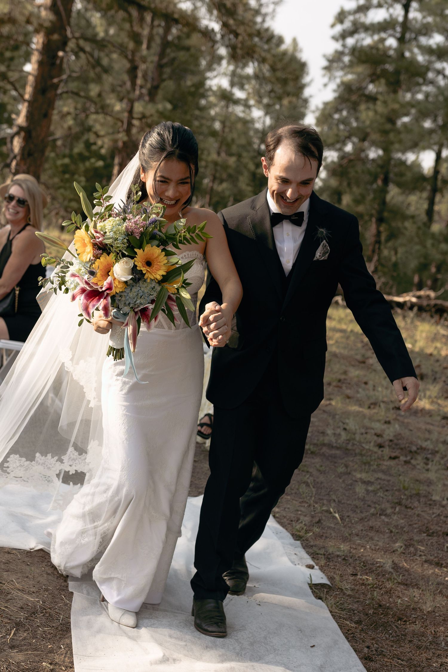 Bride and groom sharing an intimate moment during their Colorado wedding ceremony