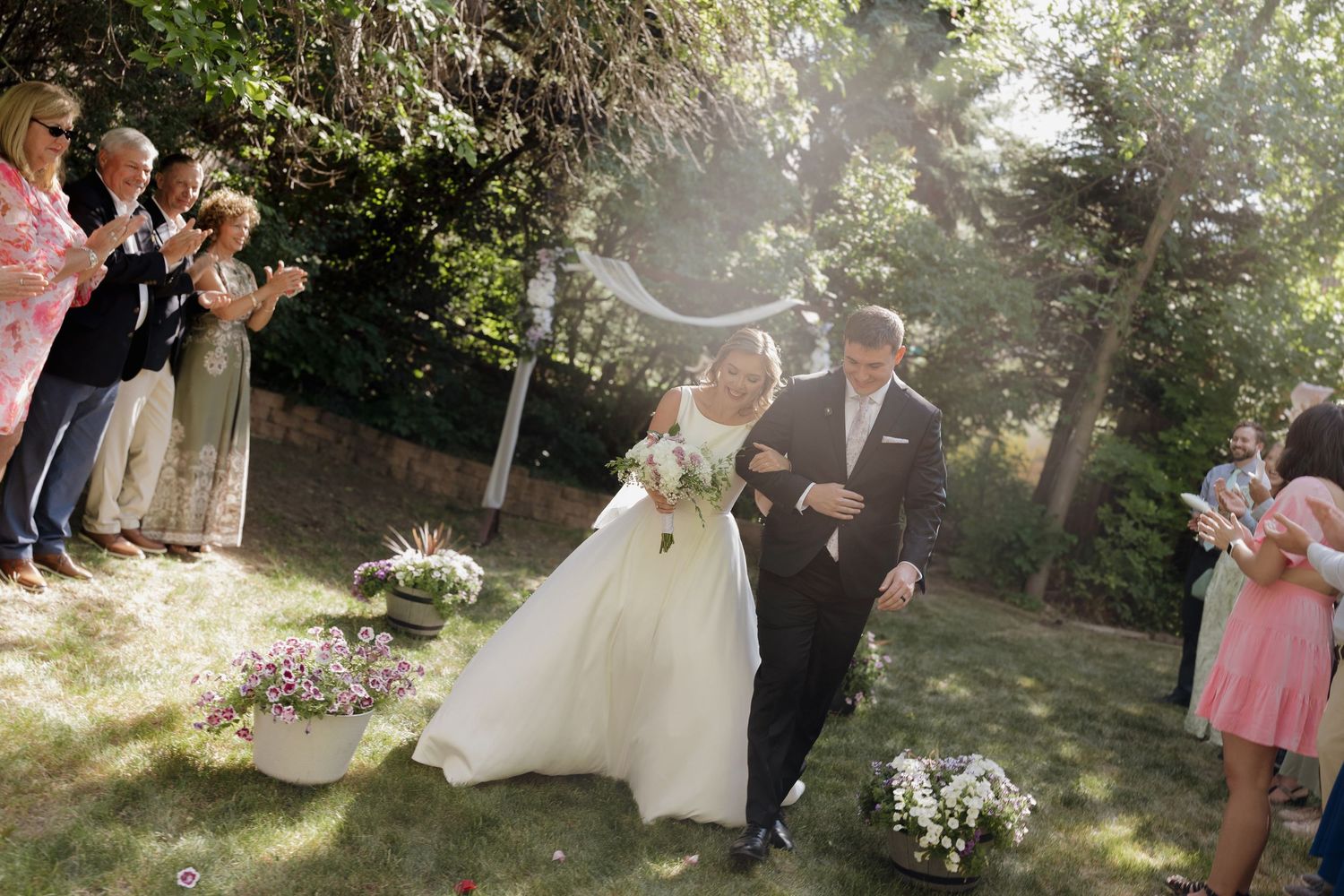 in love couple exit from the ceremony wedding