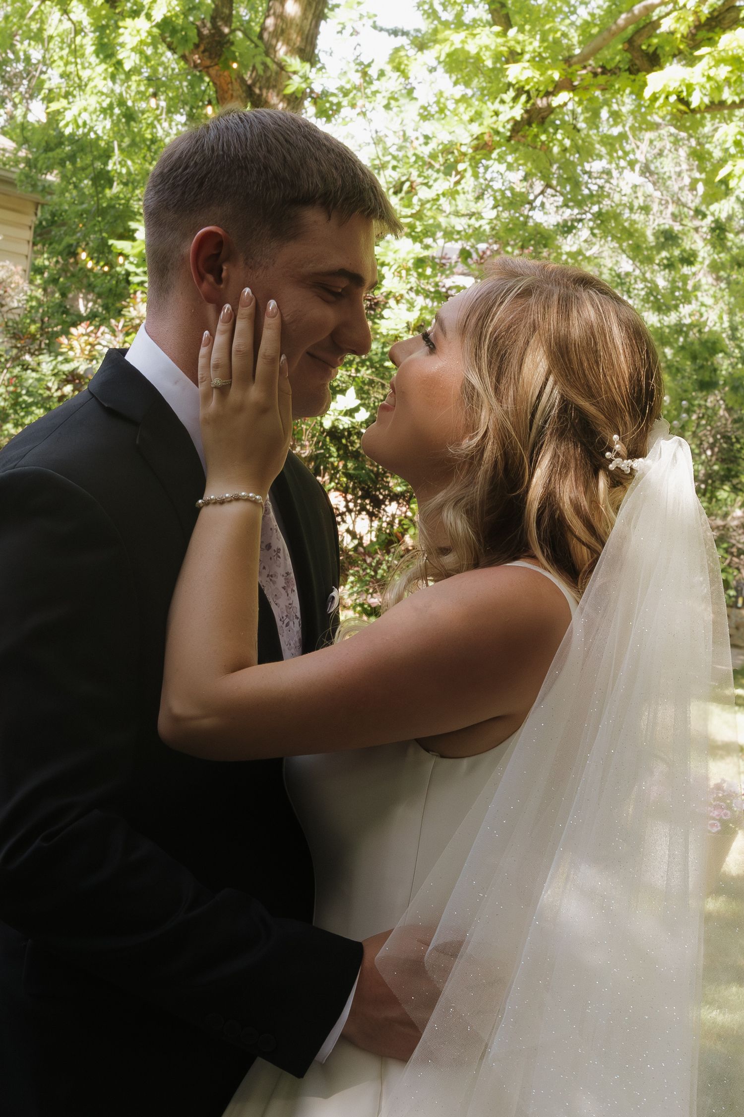 couple after wedding looking at each other in love