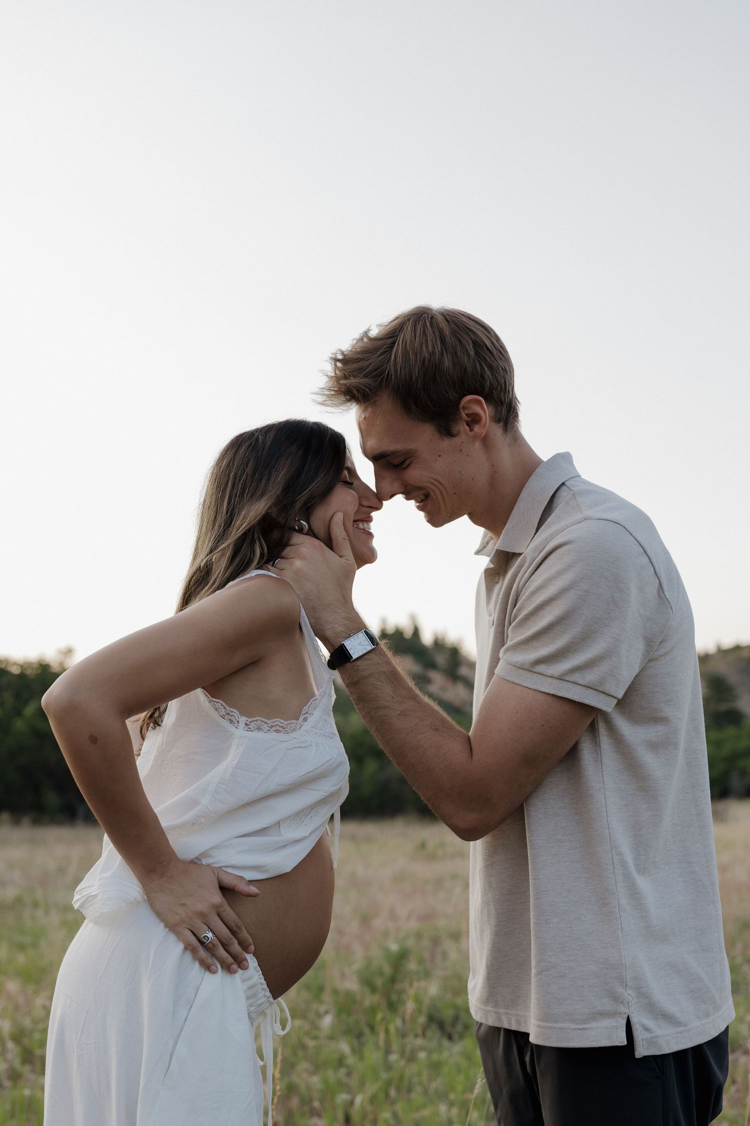 Romantic maternity portrait of an expecting mother surrounded by Colorado scenery
