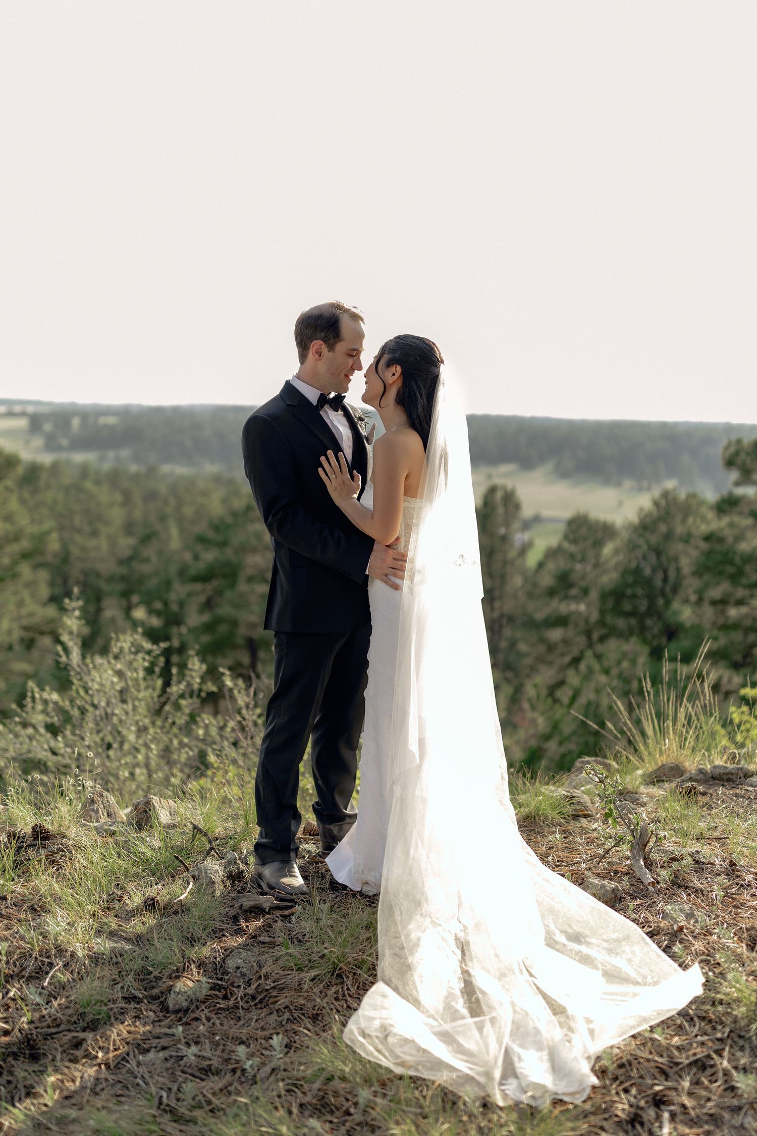 Colorado couple enjoying an intimate golden hour moment after their wedding by natalia