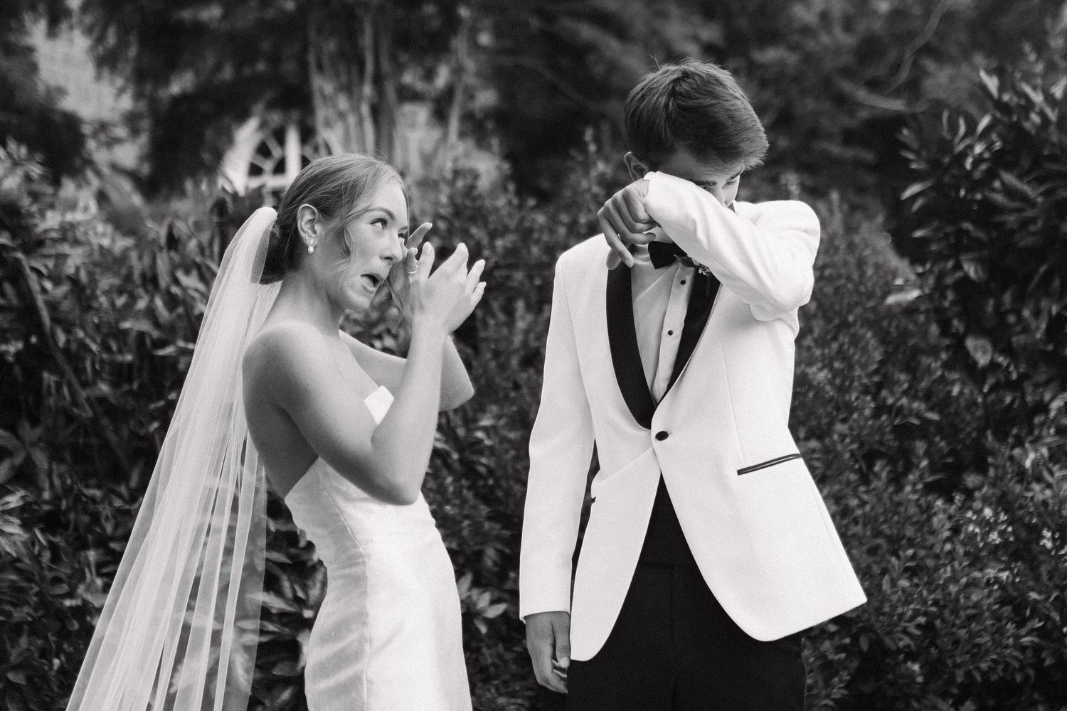Bride and groom sharing an emotional moment during their wedding day