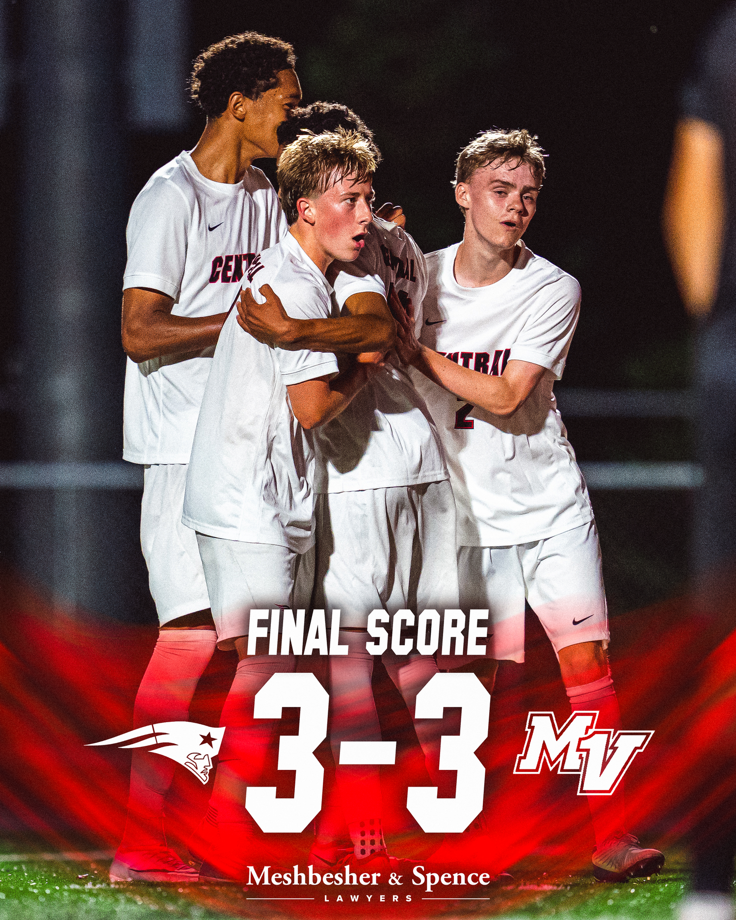 Soccer players celebrate a 3-3 final score tie game, sponsored by Meshbesher & Spence Lawyers.