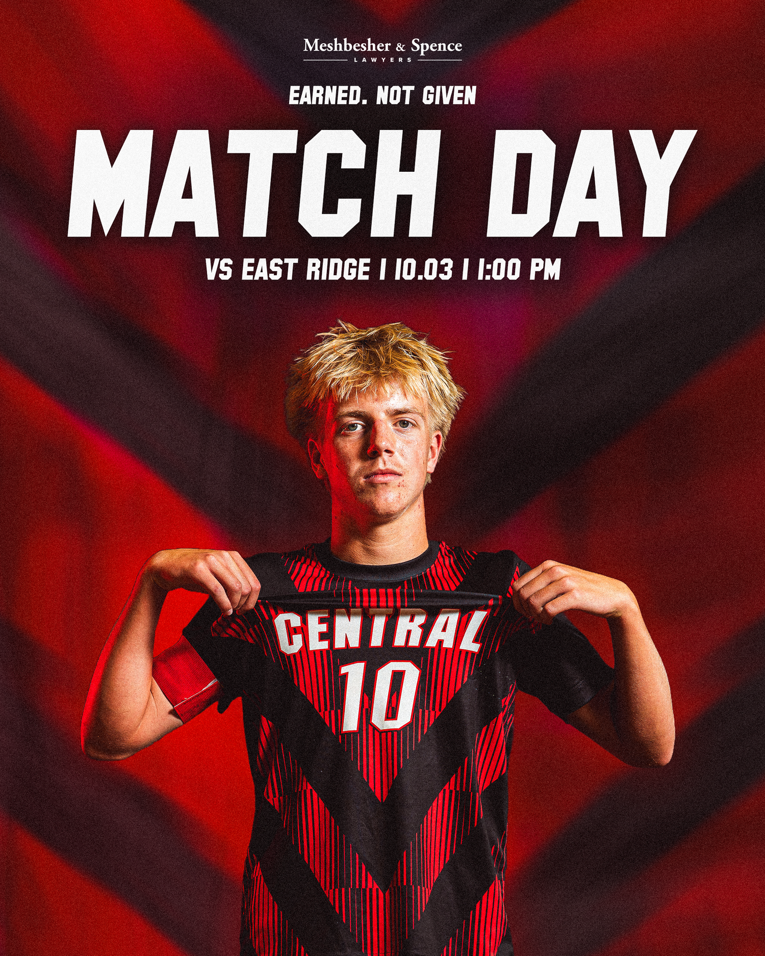 A soccer player holds a Central #10 jersey on Match Day vs East Ridge, October 3rd at 1:00 PM, sponsored by Meshbesher & Spence.