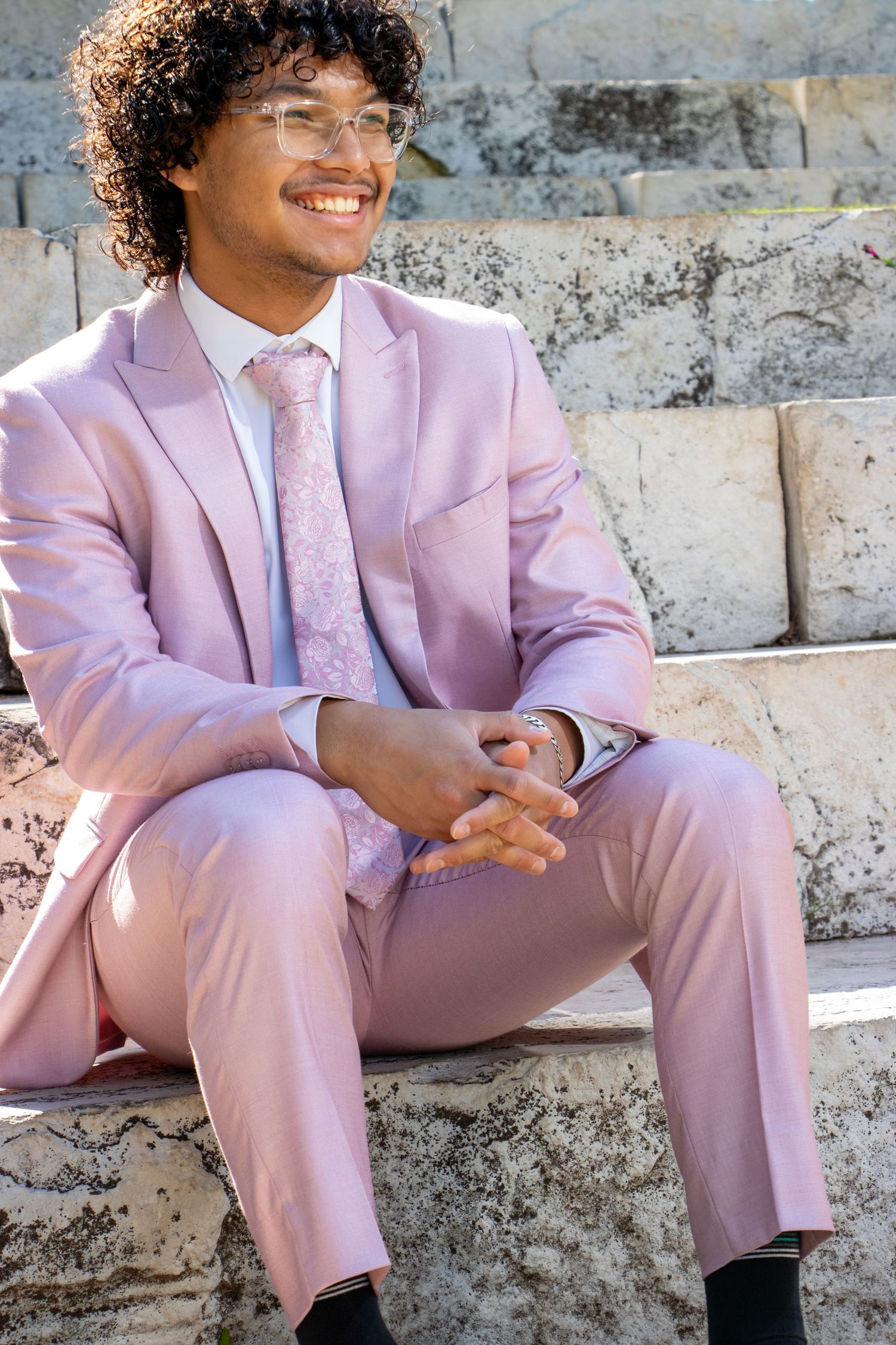 Graduation Portrait Sitting Pose in Downtown Oklahoma City Outdoor Setting