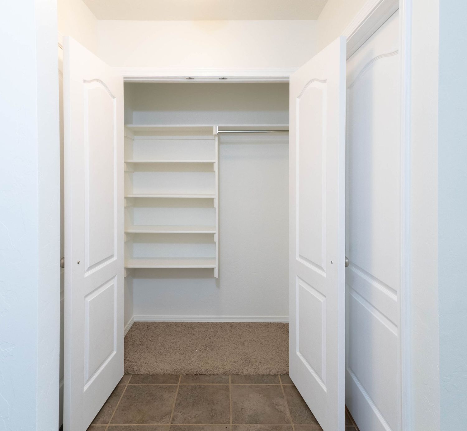 Walk-In Closet Real Estate Photography with Clean Lighting in Oklahoma City