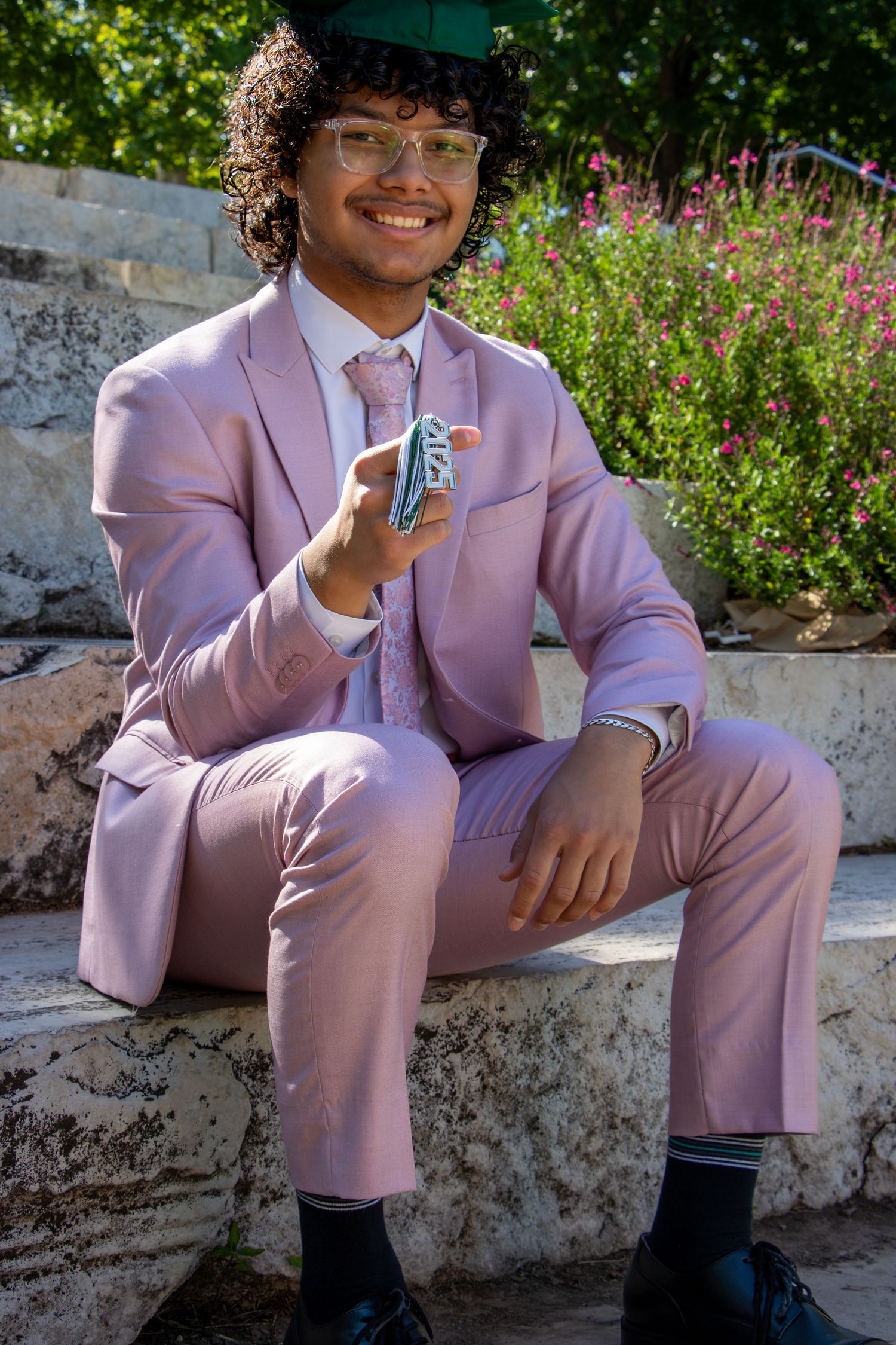 Graduation Portrait Sitting Pose in Downtown Oklahoma City Outdoor Setting