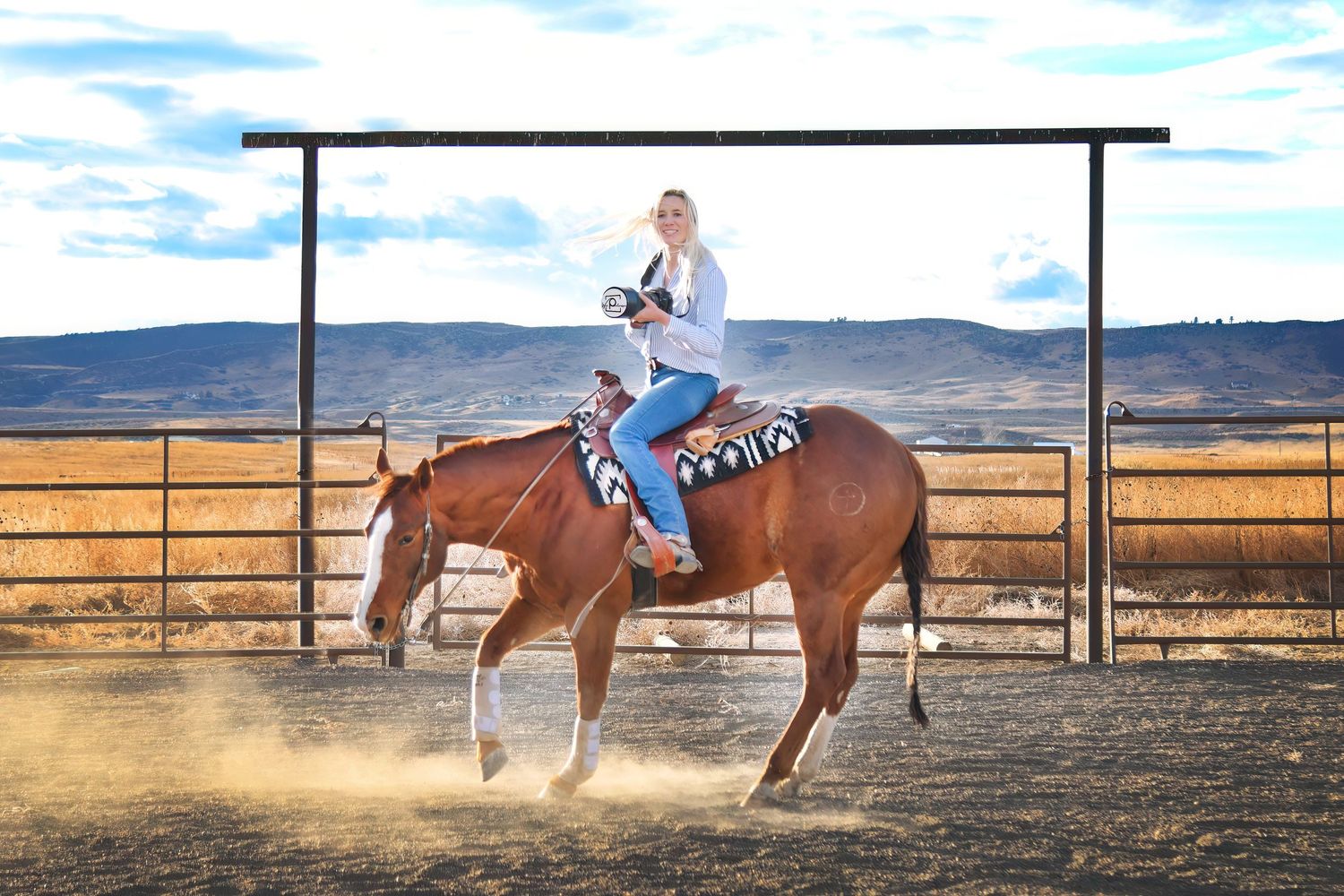 Kelsey Weir sits on a horse with her camera