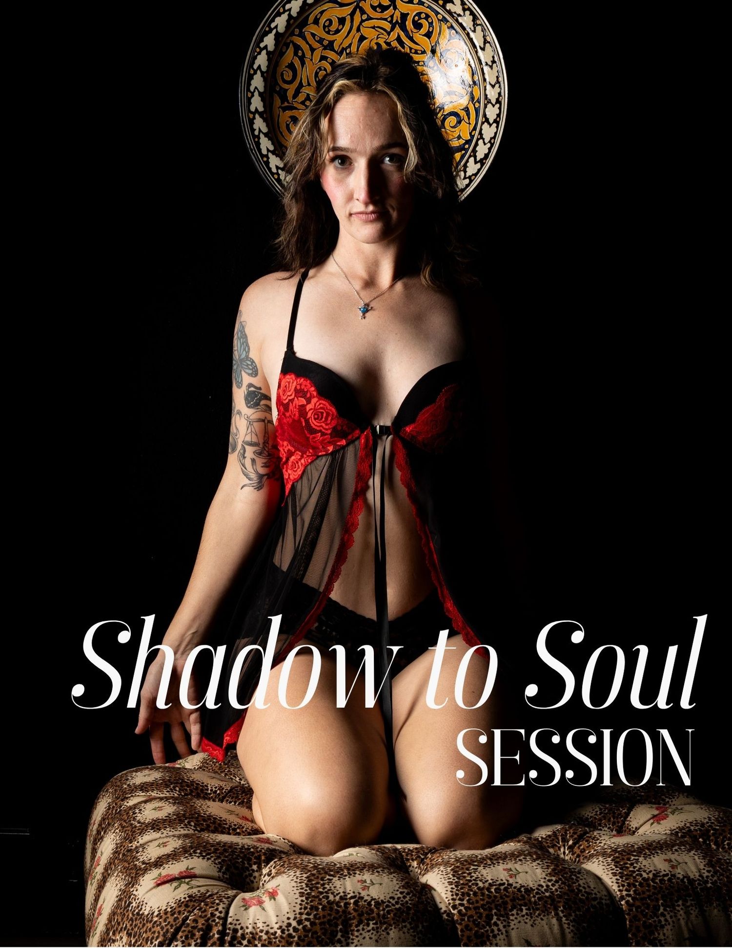 Artistic boudoir photography session with dramatic lighting and golden halo effect.
