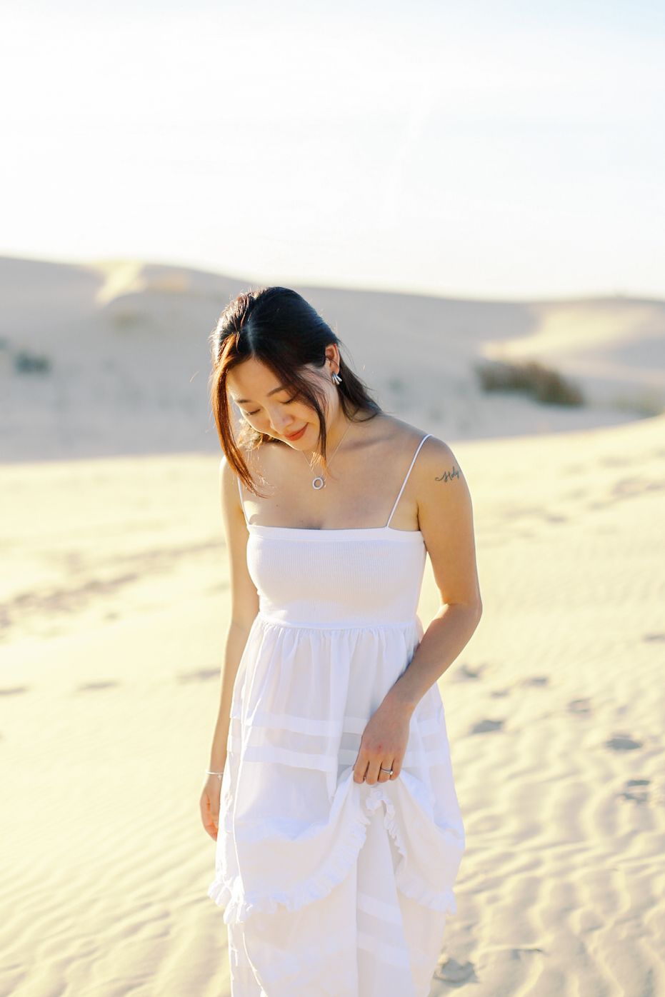 beach, sand, dune senior session  Stylish senior portrait with outfit inspiration and natural posing Texas