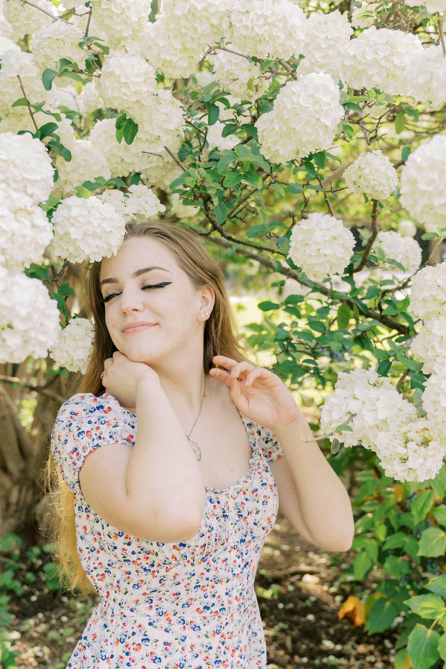 Close up senior portrait with soft lighting and authentic expression DFW