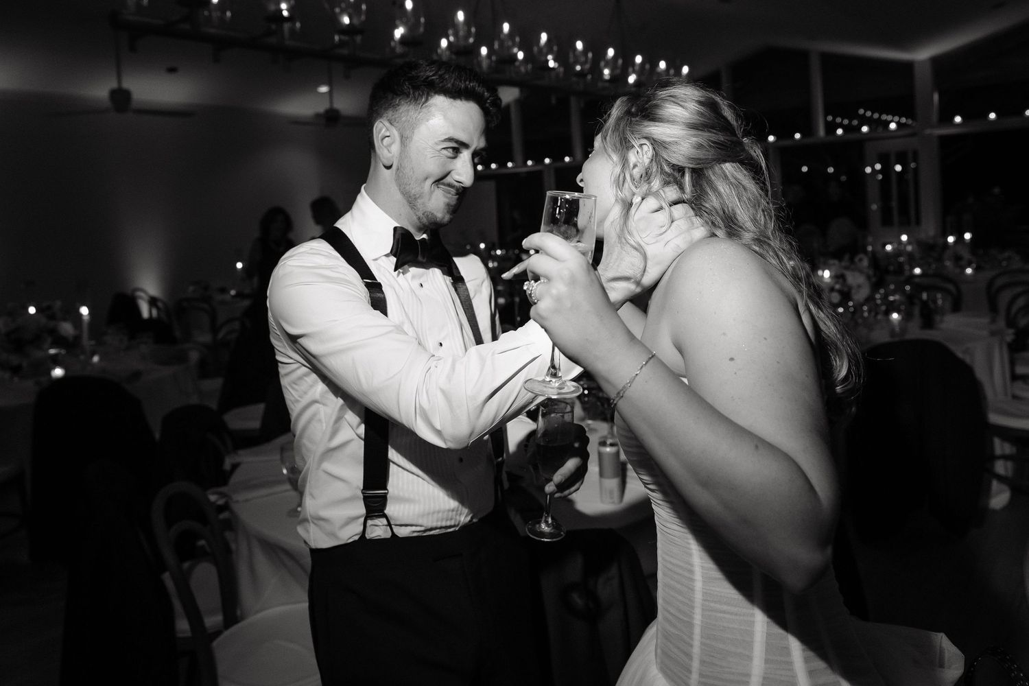 Wedding reception dance floor scenes with string lights creating a romantic atmosphere.
