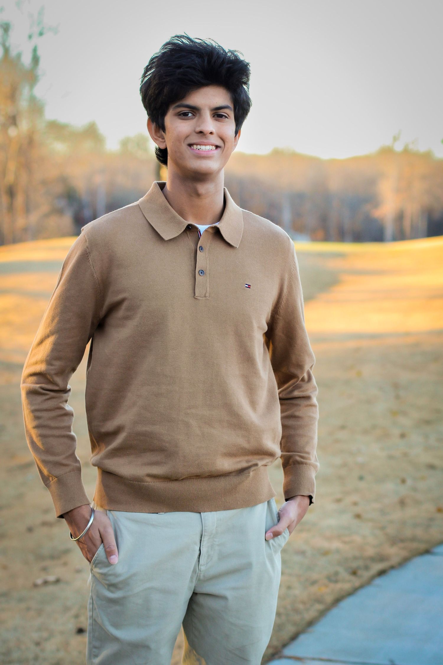 High school senior boy posing for professional senior portraits in Indian Trail, NC by Aurora Glow Photo.
