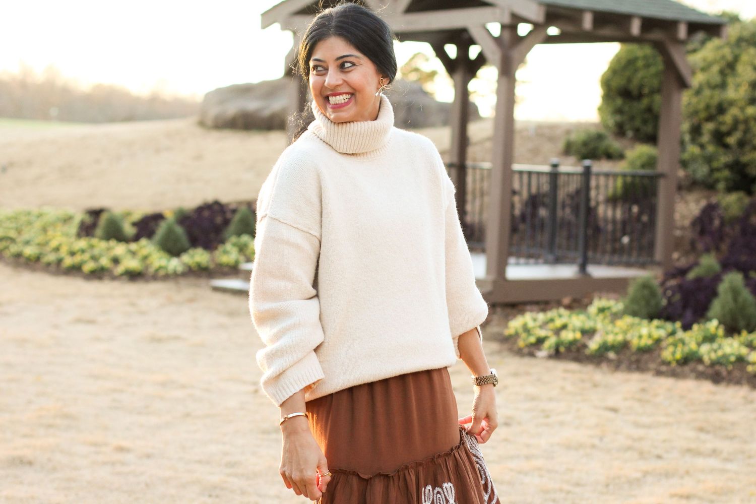 Woman twirling and smiling during a portrait session in Indian Trail, NC.