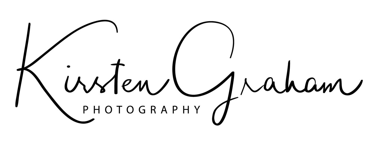 Elegant black and white signature logo design with handwritten calligraphy style text for photography business.