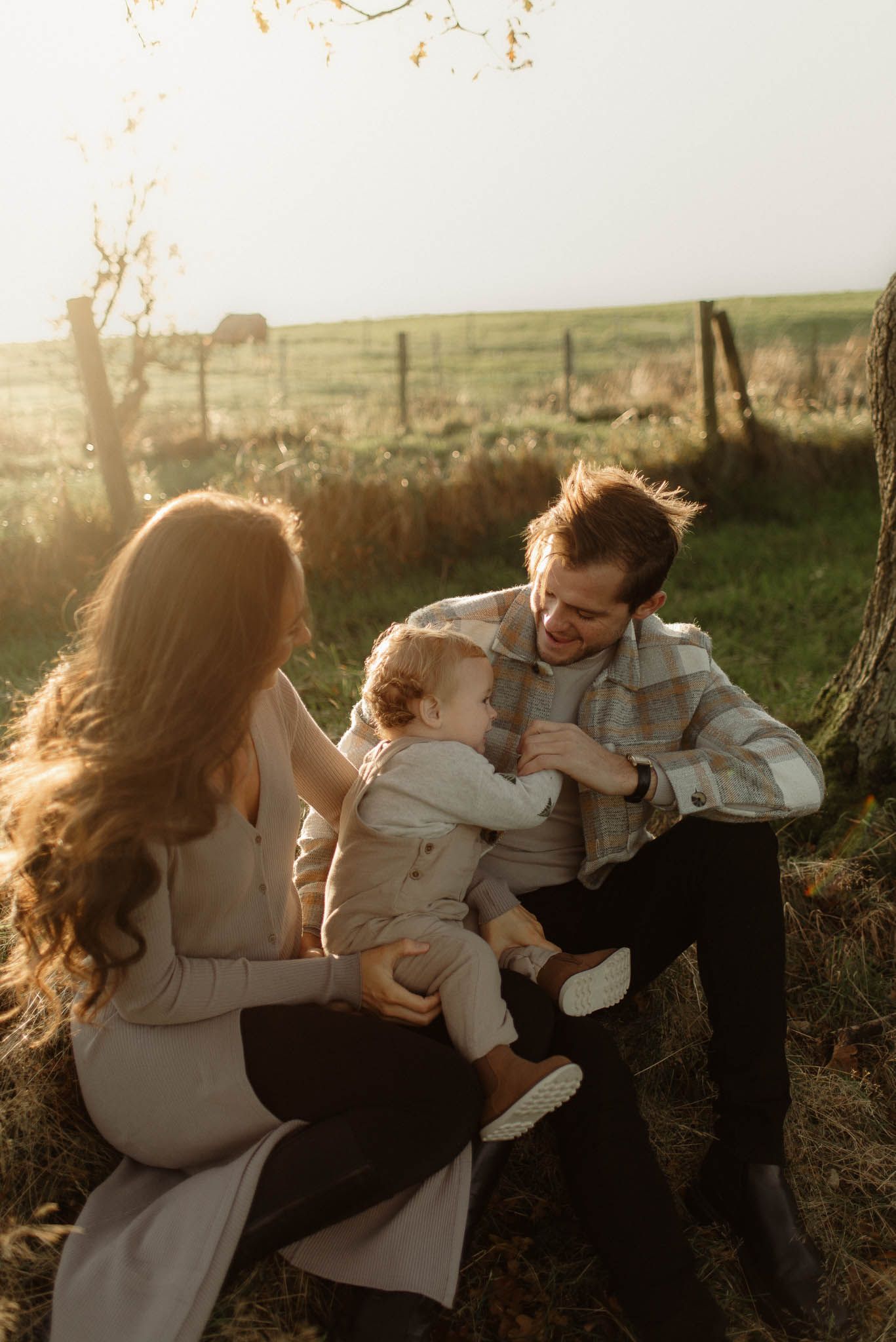 Family photoshoot outdoors during golden hour in Chorley