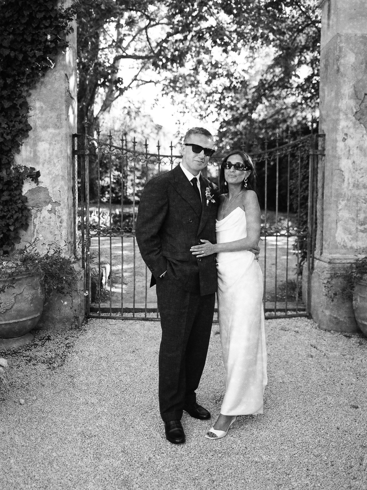 English bride and groom couple walking the galinier beaumier in Lourmarin for their destination wedding in Provence with WEP Planner