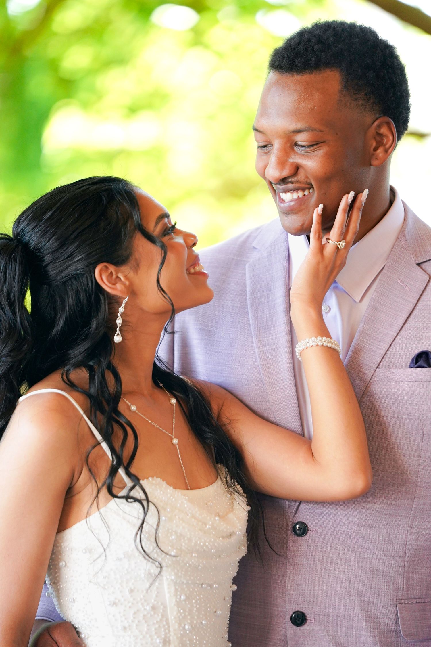 A romantic series of wedding photos showing a couple sharing intimate laughs and tender moments in natural lighting.