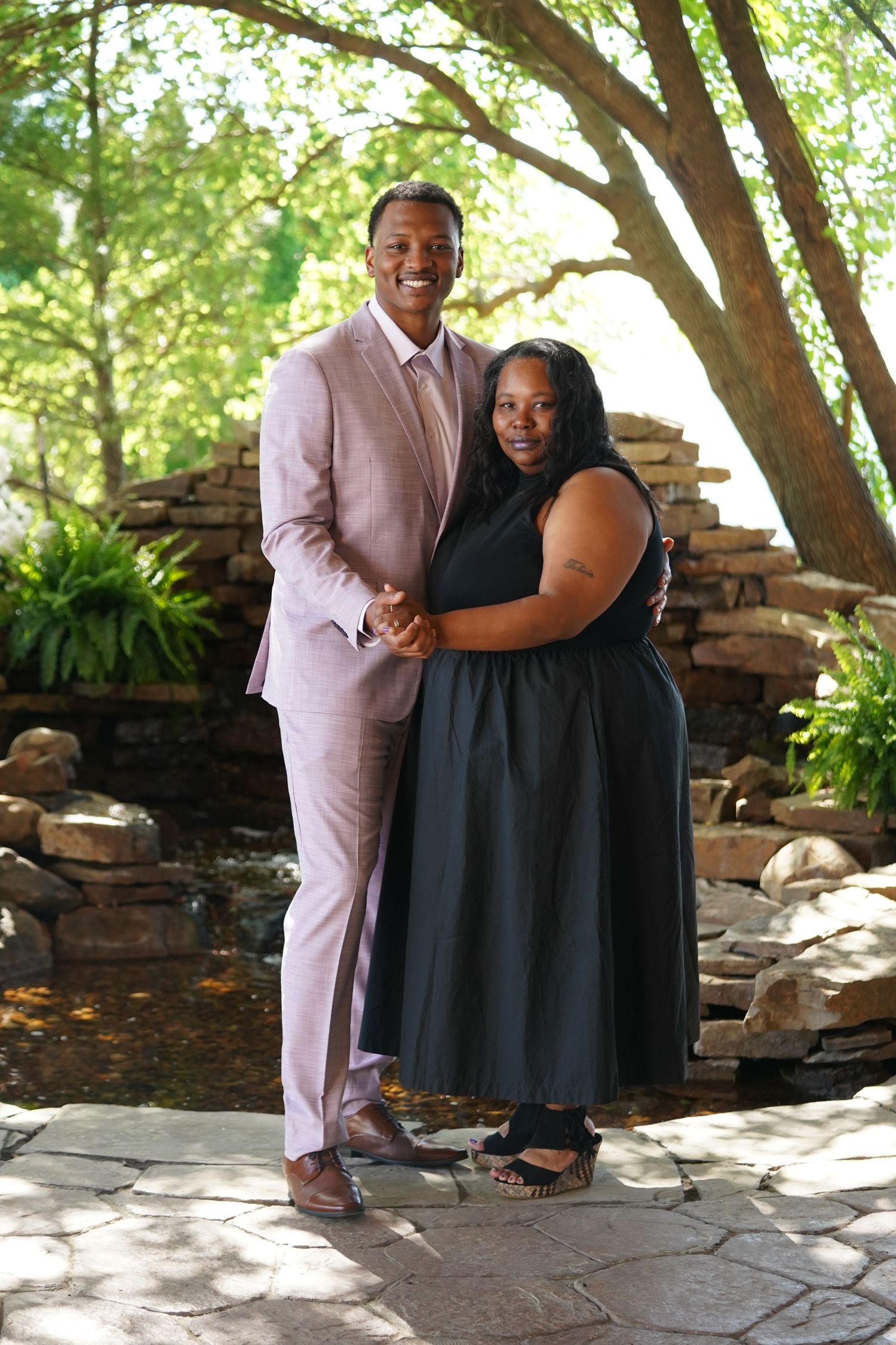A series of candid wedding photos capturing sweet moments between a couple in a garden setting.
