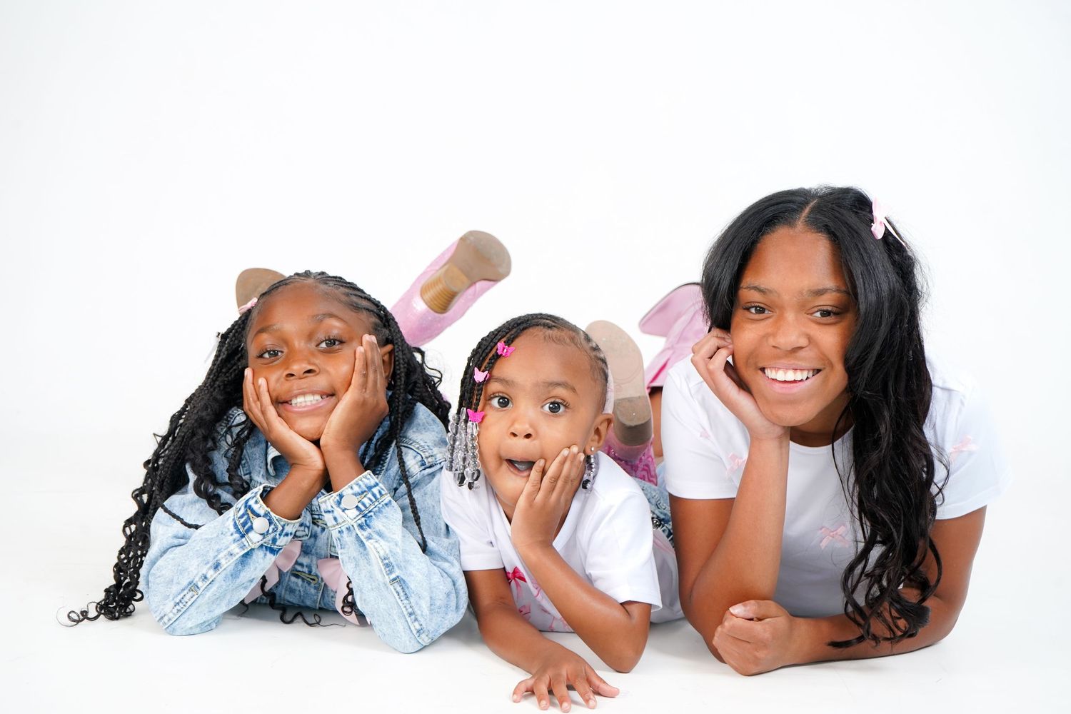 Four candid photos showing joyful expressions and playful poses on a white background.